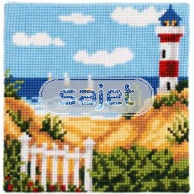 kruissteekkussen strandgezicht met vuurtoren