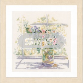 borduurpakket bloemen in zonlicht