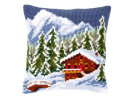 kruissteekkussen chalet in winters gebergte